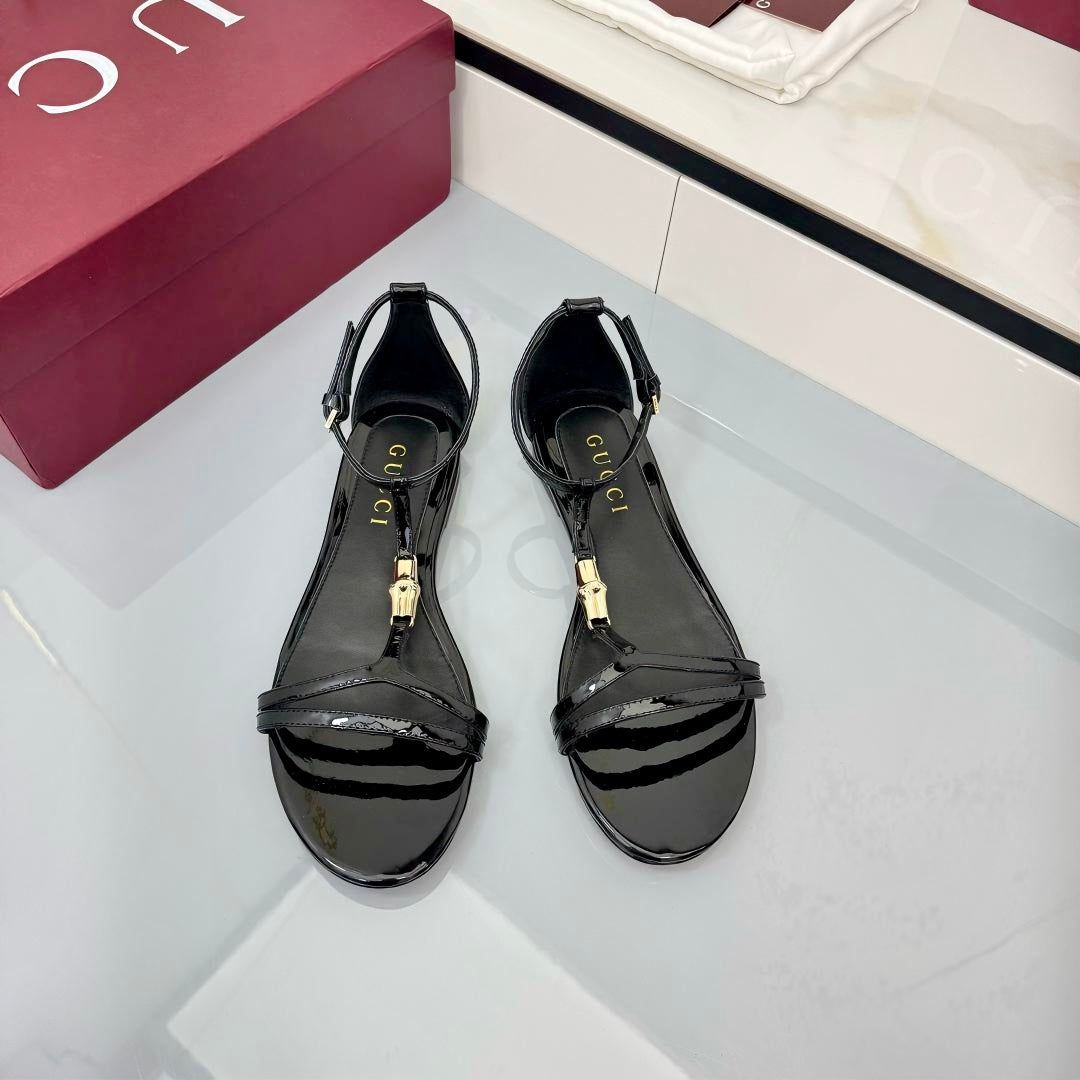 GG THONG SANDALS 25S IN BLACK LAMBSKIN WITH GOLD HARDWARE
