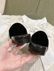 FLAT MULES IN BLACK CROCODILE EMBOSSED GLOSSY CALFSKIN