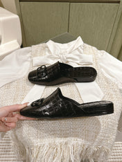 FLAT MULES IN BLACK CROCODILE EMBOSSED GLOSSY CALFSKIN