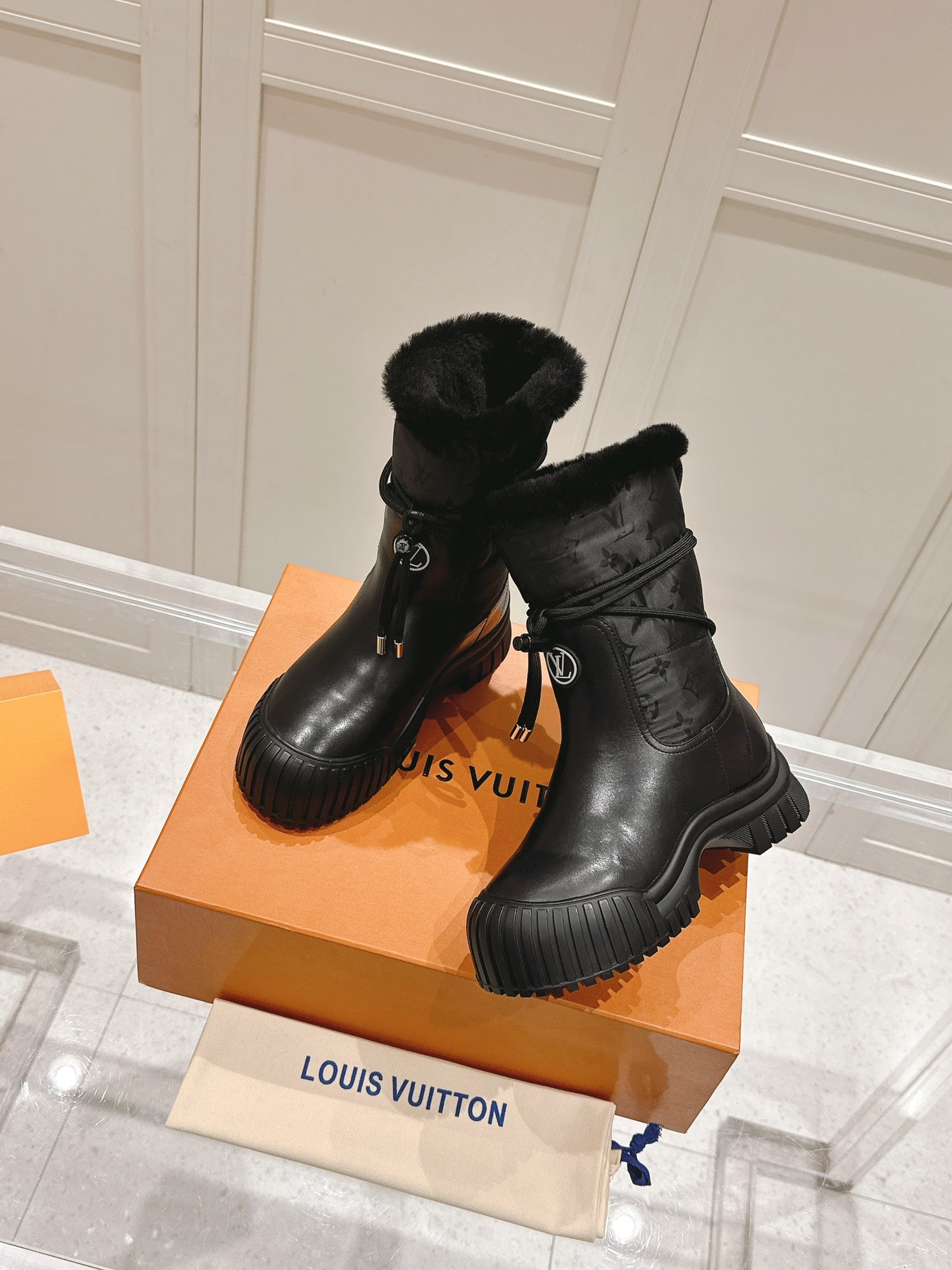 RUBY FLAT ANKLE BOOT IN BLACK CALFSKIN AND MONOGRAM NYLON