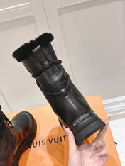 RUBY FLAT ANKLE BOOT IN BLACK CALFSKIN AND MONOGRAM NYLON