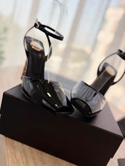 LA SCANDALE HIGH 10 CM WEDGE SANDALS IN BLACK PATENT LEATHER