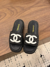CHANEL 26S PLATFORM SLIDES 40 MM IN BLACK WOVEN RAFFIA