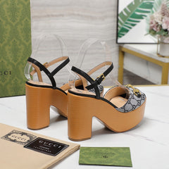 GG HORSEBIT WEDGE SANDAL IN BLACK MONOGRAM JACQUARD FABRIC AND SHEEPSKIN LINING