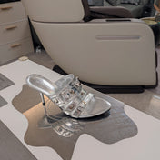 STRAPPY HIGH-HEELED SANDALS IN SILVER STUDDED WAX-OIL SHEEPSKIN