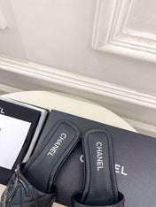 CHANEL 26S FLAT SLIDES IN BLACK LAMBSKIN WITH CC LOGO