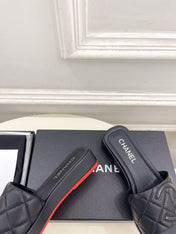 CHANEL 26S FLAT SLIDES IN BLACK LAMBSKIN WITH CC LOGO